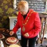 Mayor Cllr Gill Grant Judging the Cake Category - Won by Lea Parry.